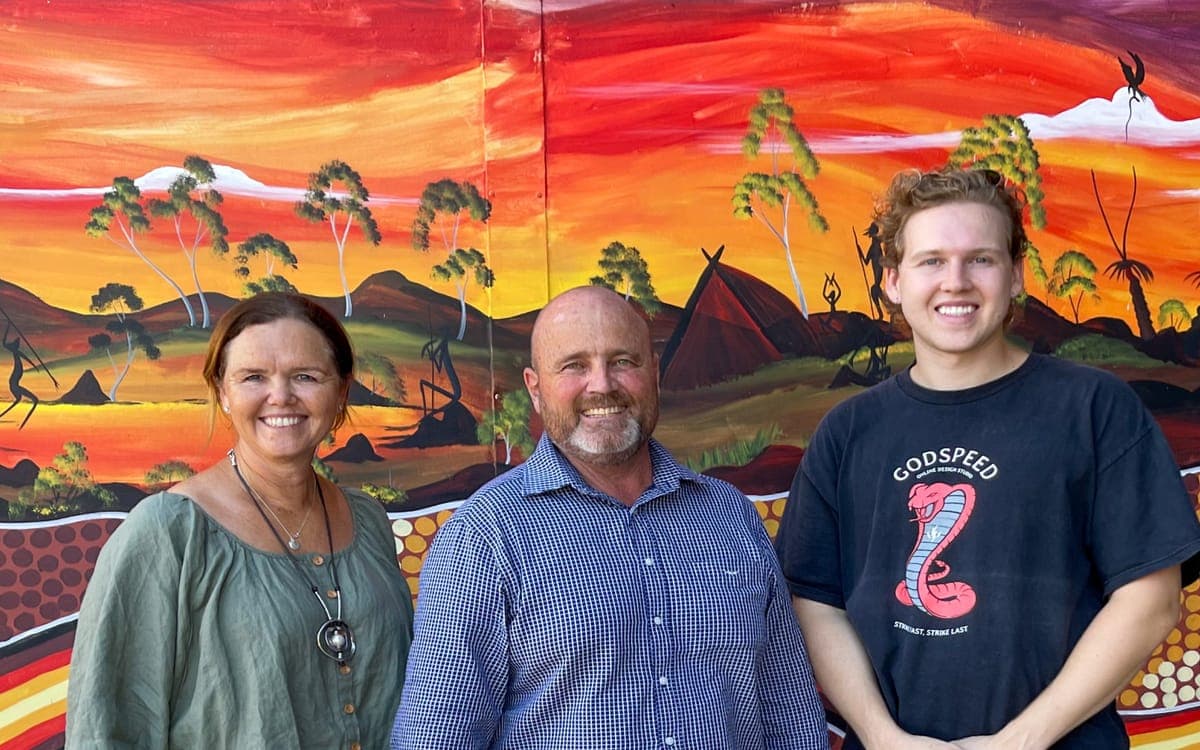 Two staff and the principal of Woorabinda State School